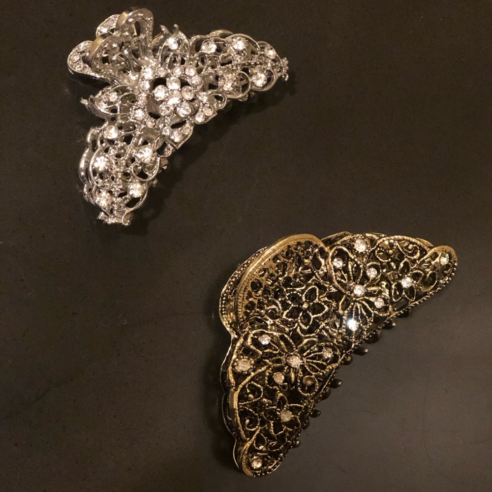 2 Hair clips. 1 silver, 1 darker gold
